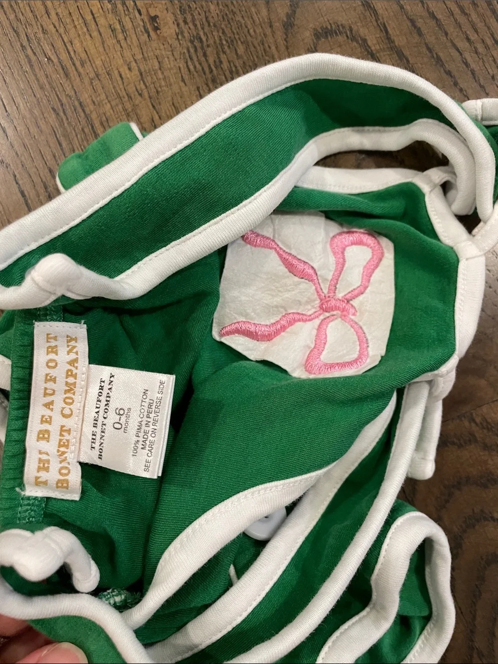 Green Kids Romper with Pink Bow Design
